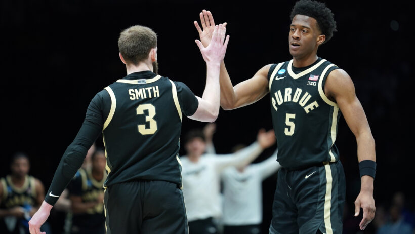 Purdue Boilermakers guard Myles Colvin high-fives guard Braden Smith