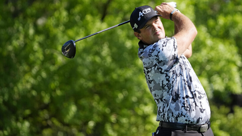 Patrick Reed admires a tee shot at the Masters in Round 1.