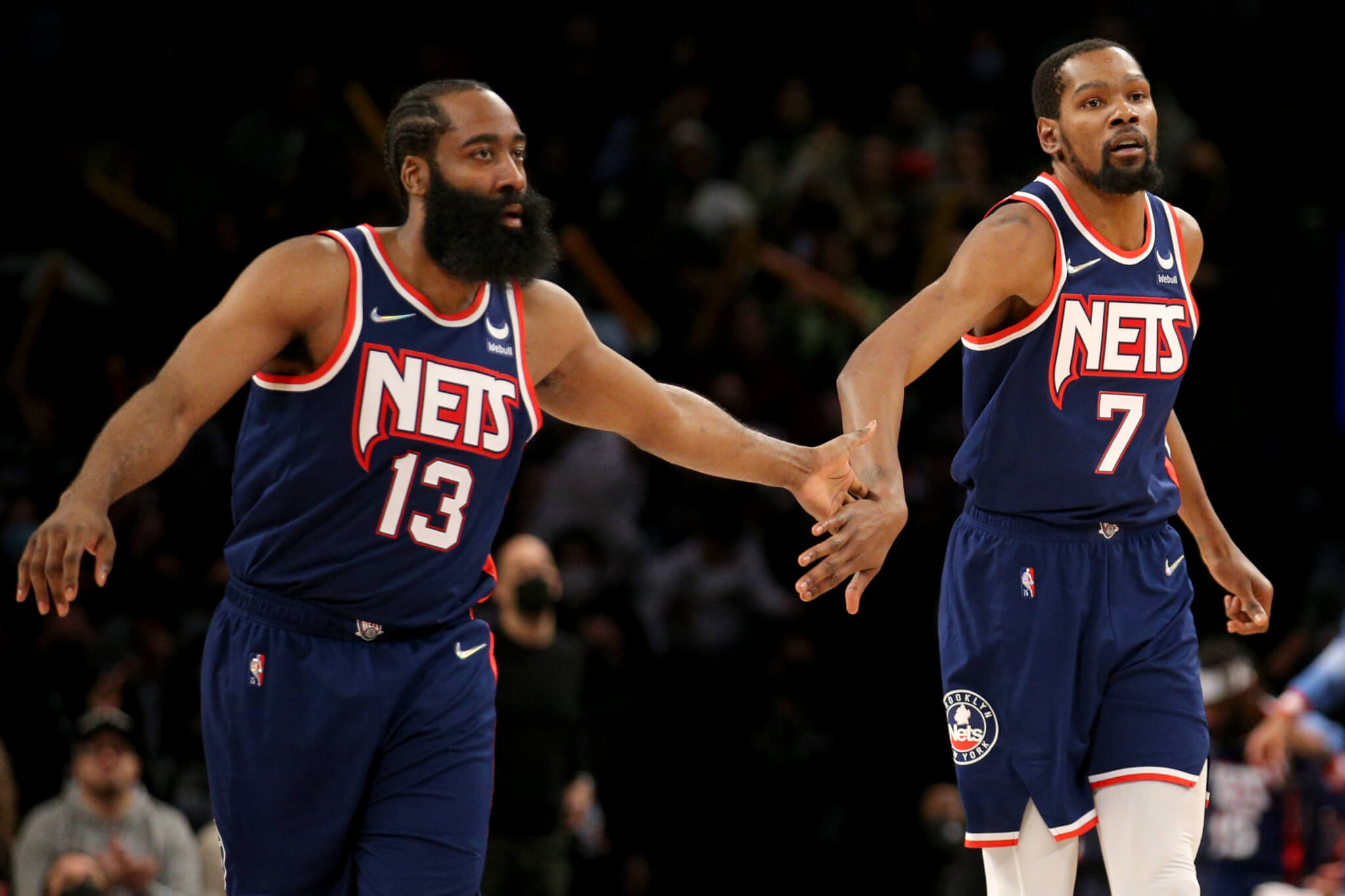 James Harden and Kevin Durant give each other five